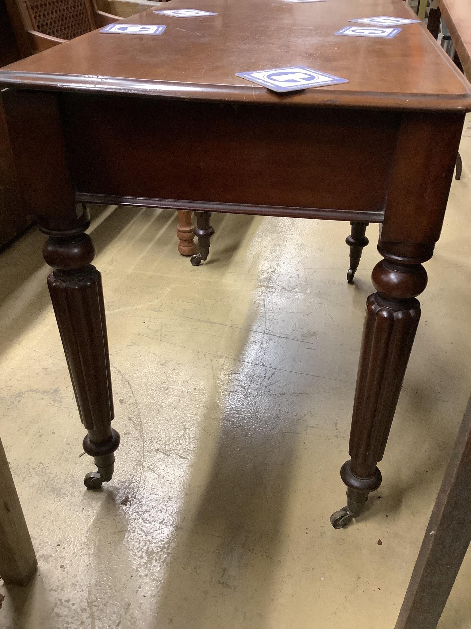 A Victorian mahogany two drawer side table, stamped Wilkinson 7514, width 99cm, depth 54cm, height 74cm